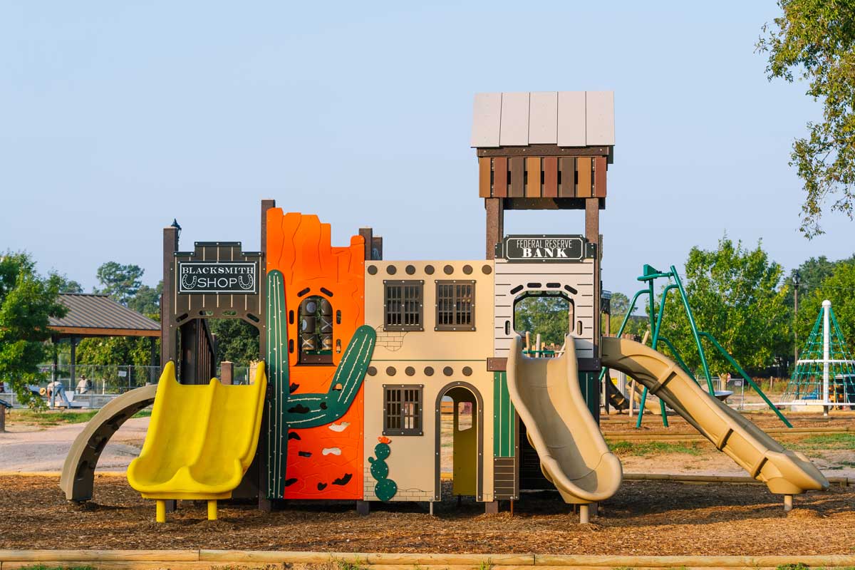 Side view of a western-themed play structure.